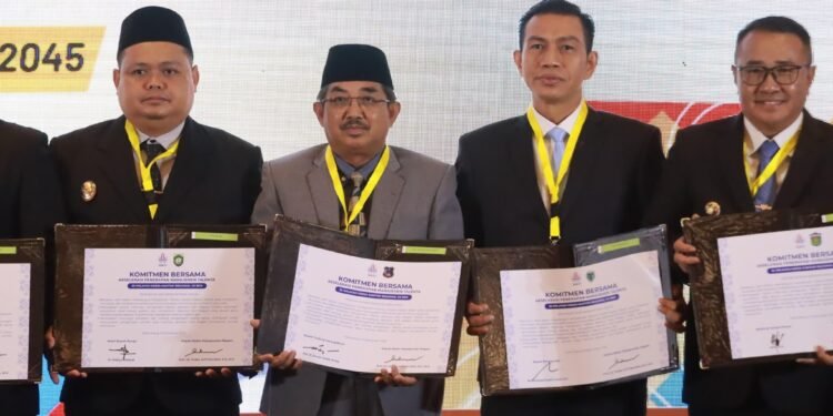 Bupati Tanjab Barat Tandatangani Komitmen Bersama Pembangunan Meritokrasi Instansi Daerah