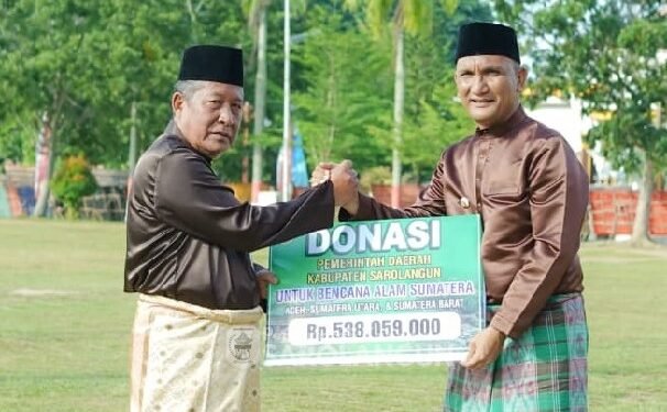 Bertepatan HUT ke 69 Provinsi Jambi Bupati Hurmin Serahkan Donasi Untuk Korban Bencana Sumatera