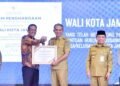 Pemerintah Kabupaten Muaro Jambi Menerima Penghargaan dari Menteri Hukum RI